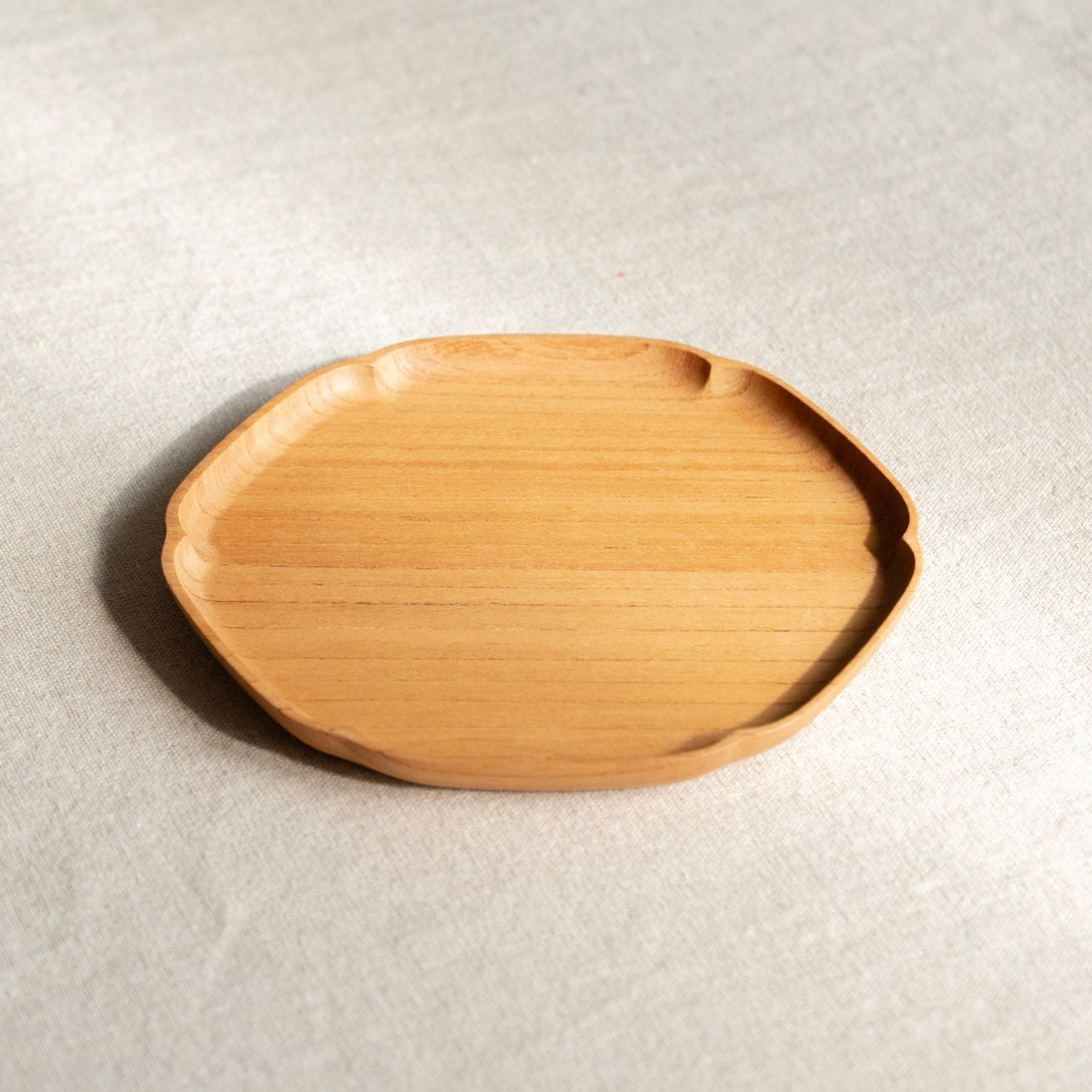small Wooden tray on a light gray surface