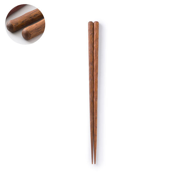 Wooden chopsticks on a white background