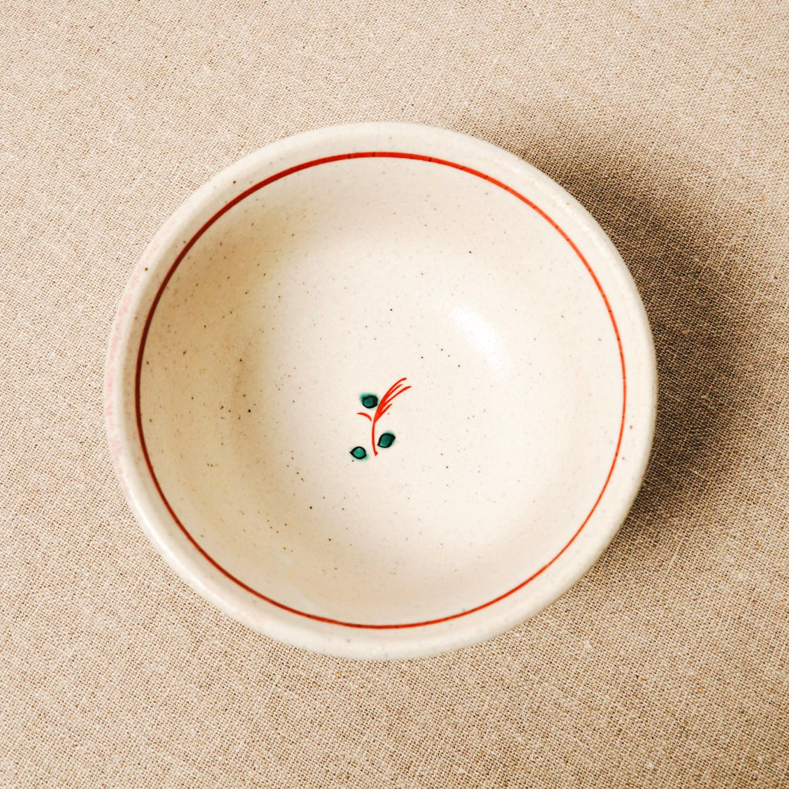 Peony and butterfly detail on Nakagawa Good Day Rice Bowl by Zoho Kiln