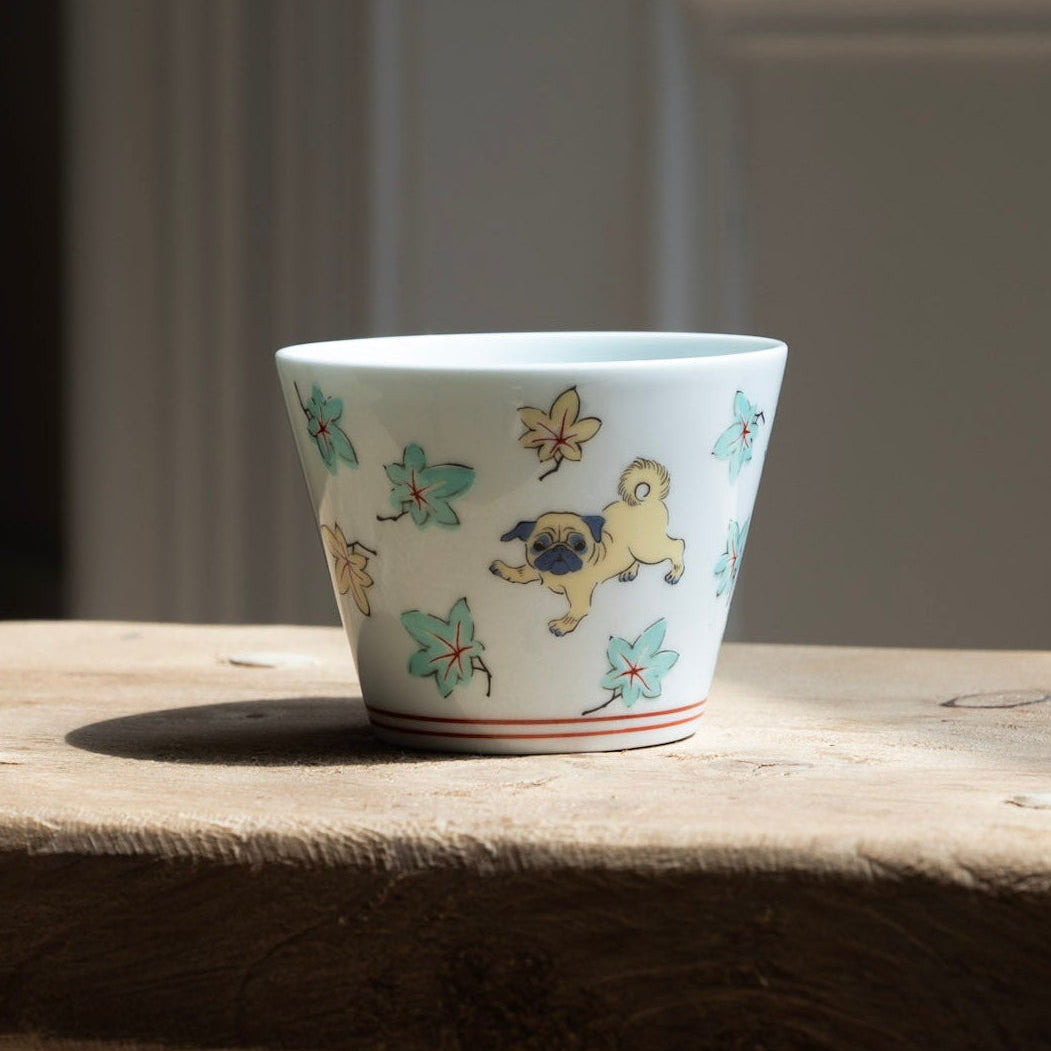 Barabar Iroe soba choko cup - small white ceramic cup with a colourful plant and pug illustration in Hasami porcelain.