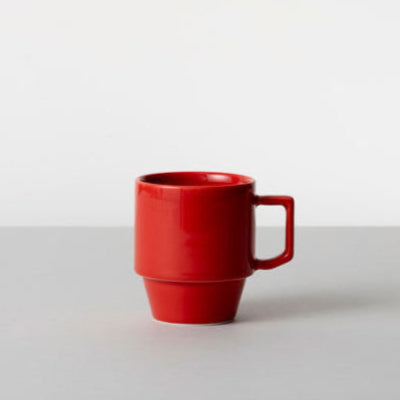 Red mug on a white background