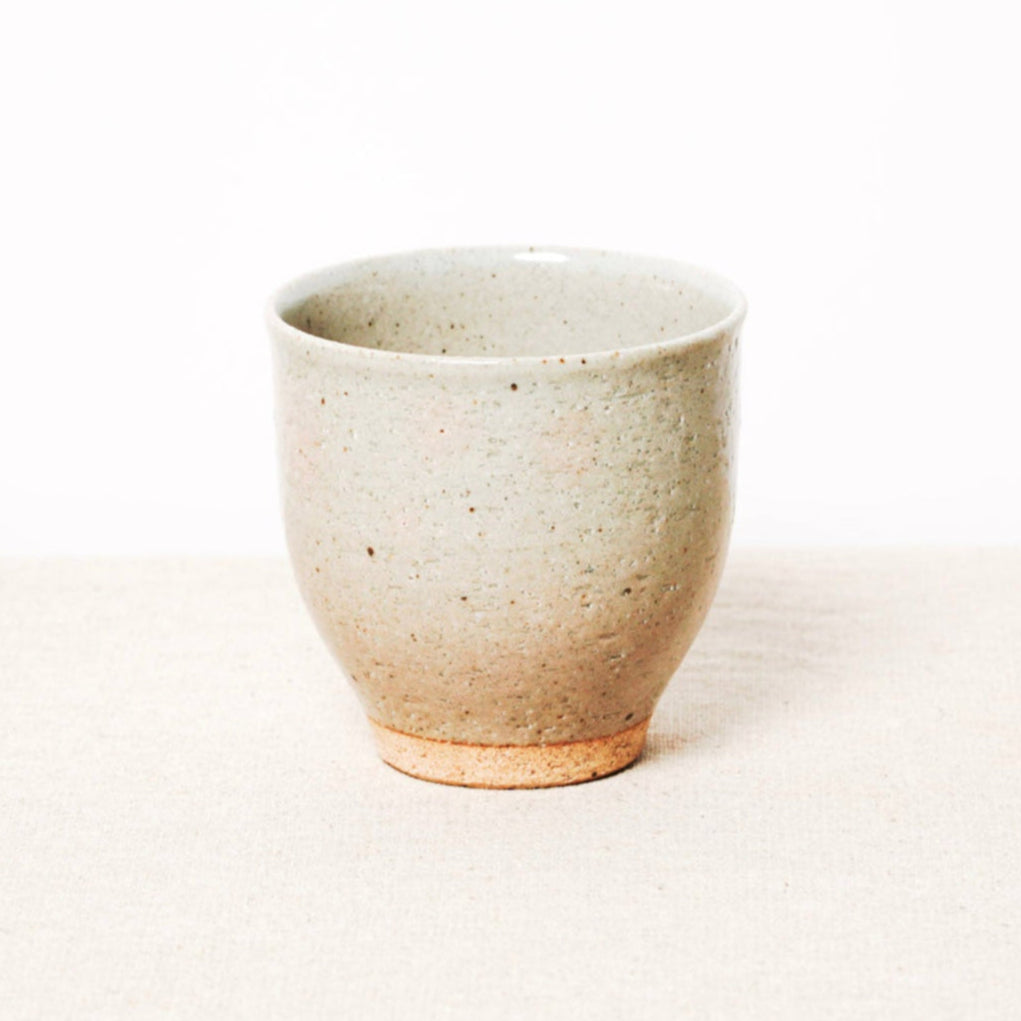 Ceramic cup on a white background