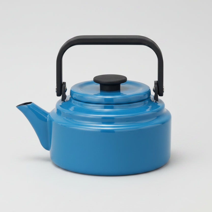 A bright blue Noda Horo enamel kettle with a black metal handle and lid knob, on a white background.