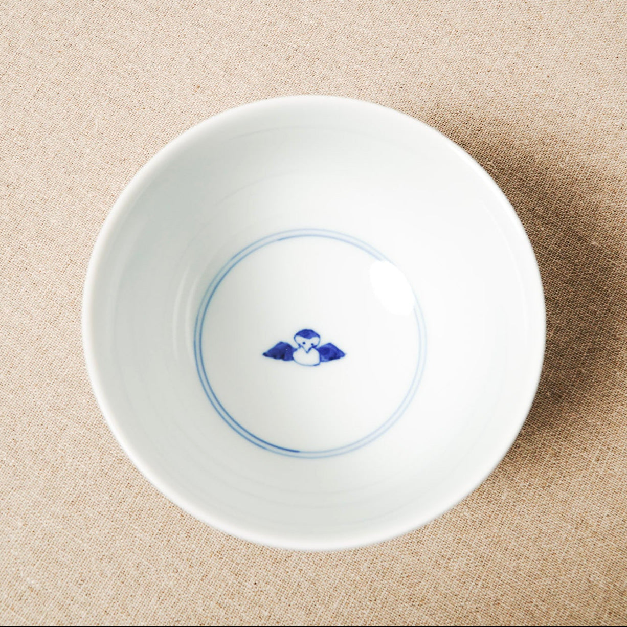 Hand-painted sparrows detail on the inside of Keizan Kiln Arita ware rice bowl